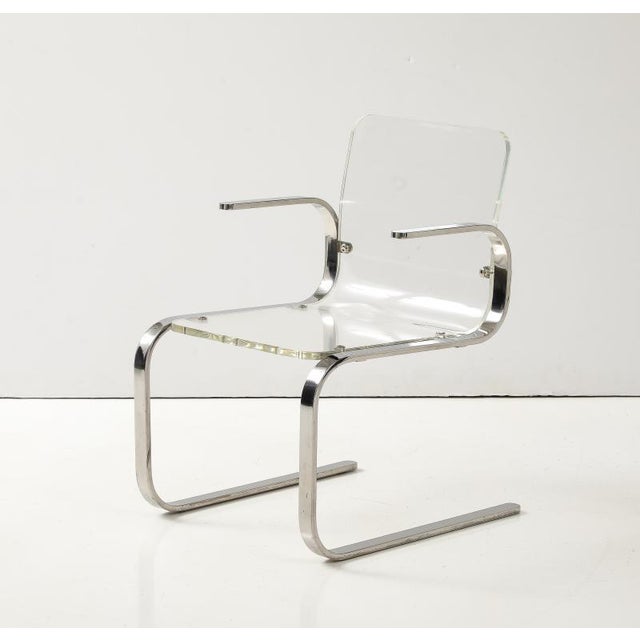 This iconic armchair perfectly captures the sleek, Space Age luxury of the 1970s, heavily reflecting the pioneering...