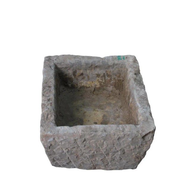 This stone trough is hand carved out one piece of stone and hand chiseled by the locals. This hand made stone planter is...