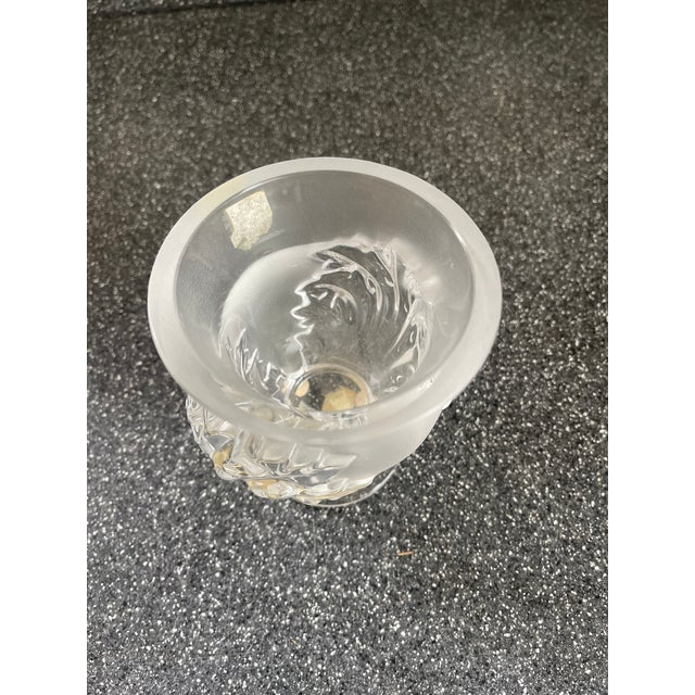 Exquisite Lalique vase with abstract motif. The abstract looks like a swirl or a leaf. The love its weight.