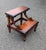This vintage wooden step stool brings a touch of classic library elegance and practical utility to any room in your home....