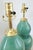 Offering a pair of beautiful coastal blue/turquoise crackled porcelain double gourd shaped table lamps, circa Late 20th...