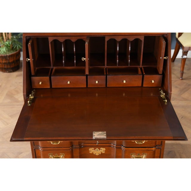 A Vintage Mahogany Councill Secretary Desk brought to you by Niagara Furniture. This item has all of the bells and...
