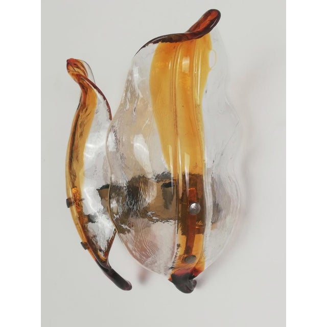 A Set of 3 wall lights attributable to the historic Italian Company "La Murrina" The set consists of 2 sconces equipped...