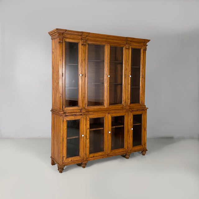 Italian mid-19th century style sideboard in wood and glass, 1930s Sideboard with two modules, with six compartments...