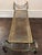 Mid 20th century Italian gilt metal rope and tassel bench, with rich patina of the red undercoat beneath the gilt finish....