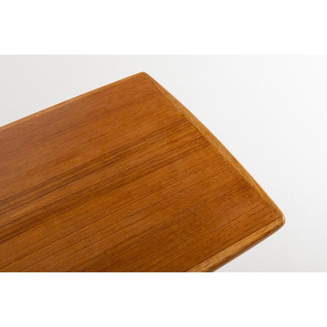 Scandinavian Swedish Modern teak top coffee table on varnished oak frame produced in 1960s. Condition Excellent I have...