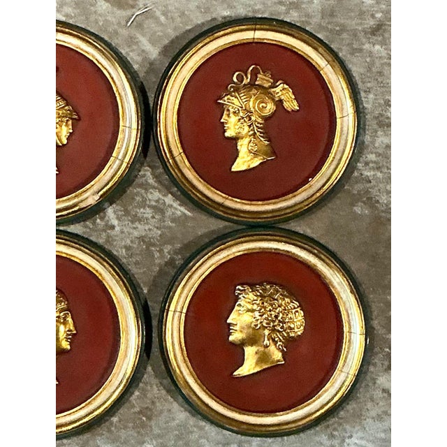 This exquisite set of four vintage Grand Tour medallions captures the timeless allure of Neoclassical antiquity. Each...