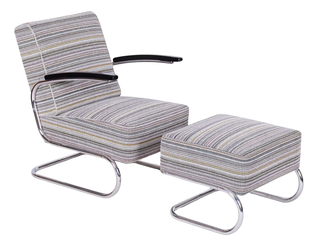 Silver metal armchair and ottoman with striped fabric on a white background.