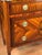 This refined marquetry Louis XVI chest of drawers originates in France and dates to around 1770, during the Transition...