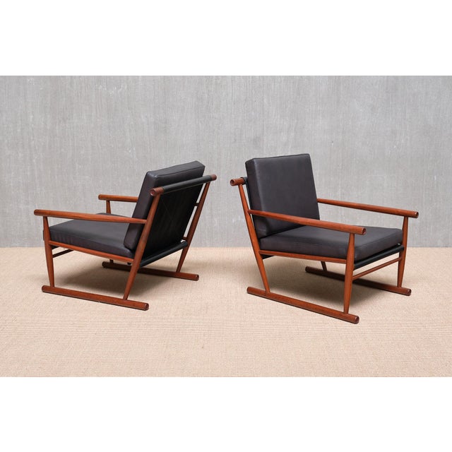 This rare pair of sculptural armchairs was designed and produced in Scandinavia in the 1950s. The striking design features...
