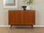 Classic chest of drawers from the 1960s. Body in teak veneer with two cabinet doors, two shelves and new square steel feet...