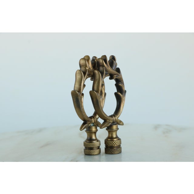 Pair of cast metal vintage finials, sized to fit lamp harps with a standard-size 1/4" stem.