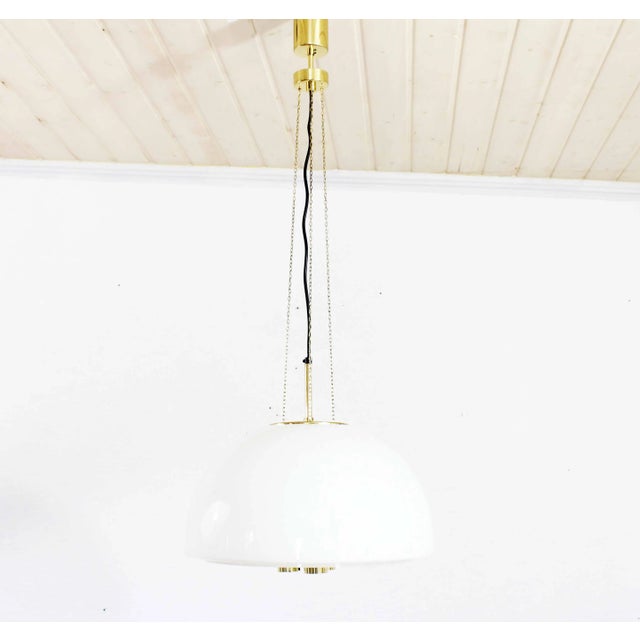 Opaline and Brass Ceiling Lamp from Glashütte Limburg, 1960s, in Very Good conditions. Designed 1960 to 1969 This piece...