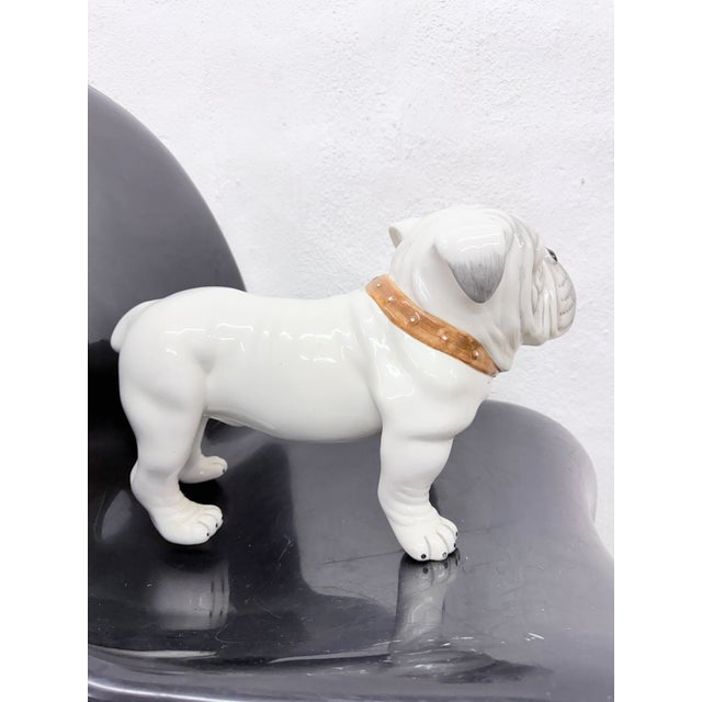 One 1970s-era dog figurine, an English Bulldog by C.S.M., Italy. Ceramic. Good used condition. One superficial stress...