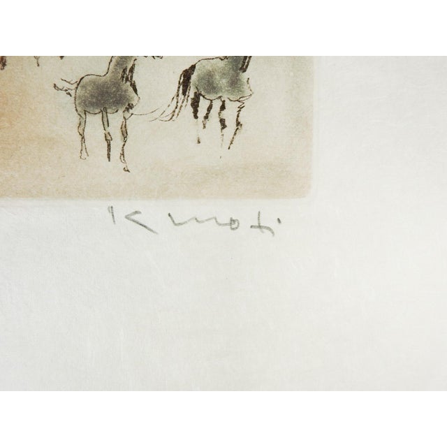 Late 20th century aquatint etching on handmade paper of horses in shades of umber and gray by Kaiko Moti (1921 - 1989)...