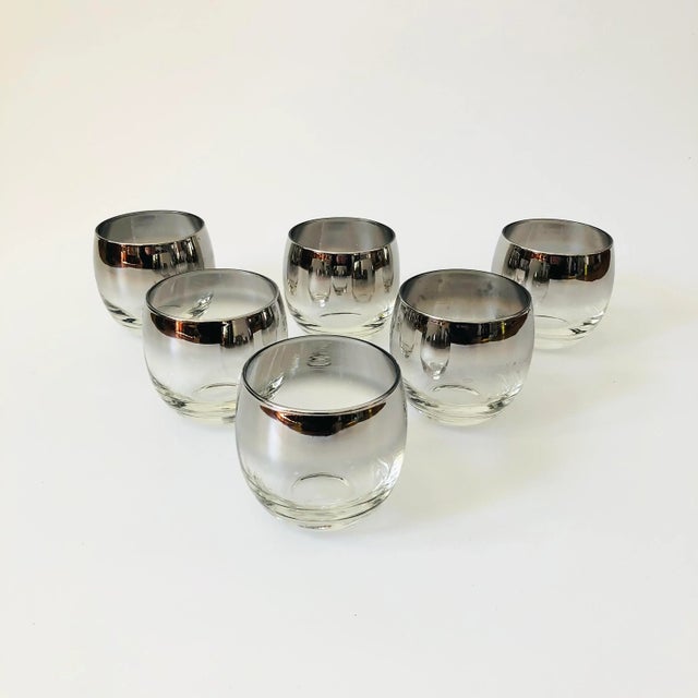 A beautiful set of 6 mid century silver fade roly poly cocktail glasses. Each glass decorated with metallic silver that...