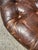 Wood Chesterfield-Style Round Chocolate Leather Ottoman-Vintage For Sale - Image 7 of 7