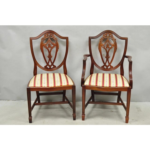 Vintage Sheraton Federal Style Mahogany Ribbon & Drape Carved Shield Back Dining Room Chairs - Set of 6. Set includes (2)...