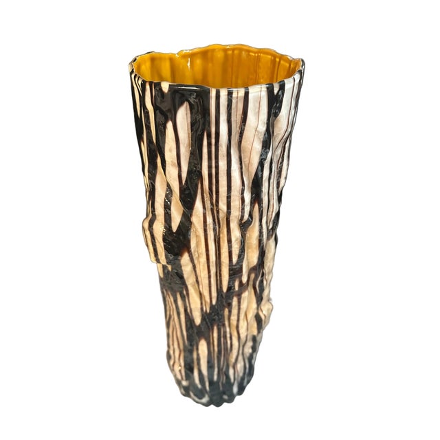 Extraordinary glass encased vase in the form of a tree trunk or log . A tall cylindrical vase with free-form glass outer...