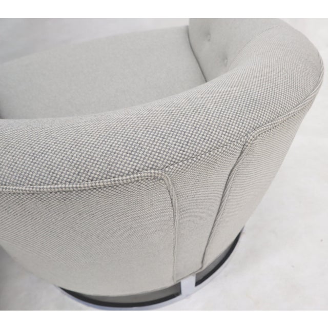 Mid-Century Modern barrel back lounge chairs newly upholstered in basket weave wool/flax blend fabric. Chrome bases.