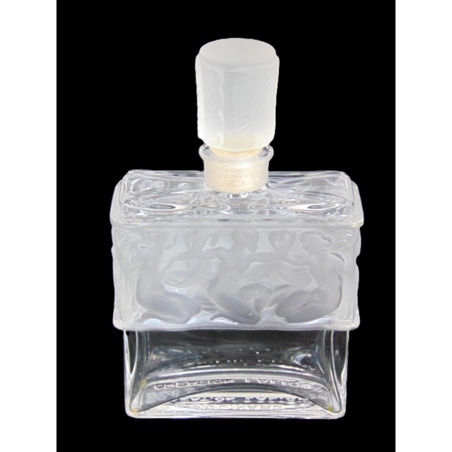 Vintage Lalique Molinard de Molinard Perfume Bottle. The bottle stands 4.75" tall (with stopper), 2.75" wide, and 1.25"...