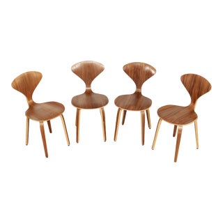 Mid Century Modern Style Set of Four Sculpted Walnut Dining Chairs For Sale