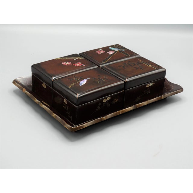 An early circa 1900's English (Chinese Export) lacquered games box and tray. It is handcrafted of papier mache and...