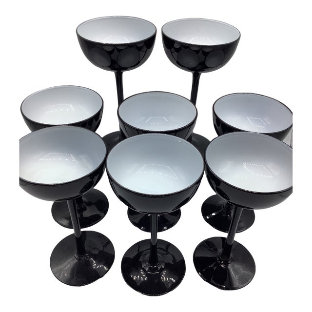 A chic and elegant set of 7 vintage Carlo Moretti cased glass black and white tall stem Champagne Coupes. They measure 6...