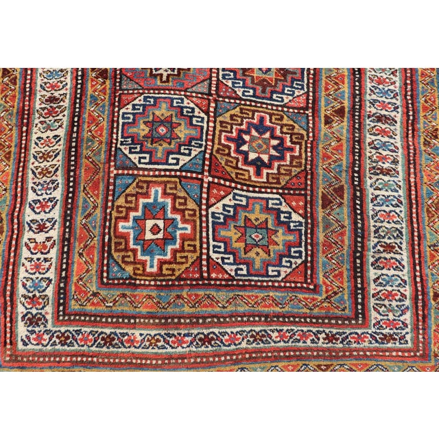 Textile Antique Caucasian Kazak Rug With Red Field and Star Medallion Design For Sale - Image 7 of 12