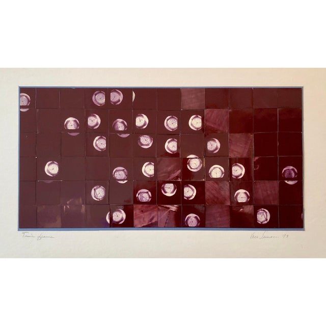 This one depicts a sports wristwatch over an aerial city or field landscape and is titled "Time Frame". It is signed and...