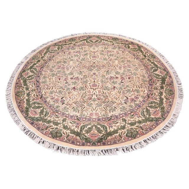 This hand‑knotted Pak Persian round rug showcases the finest expression of traditional Persian artistry. Each piece is...