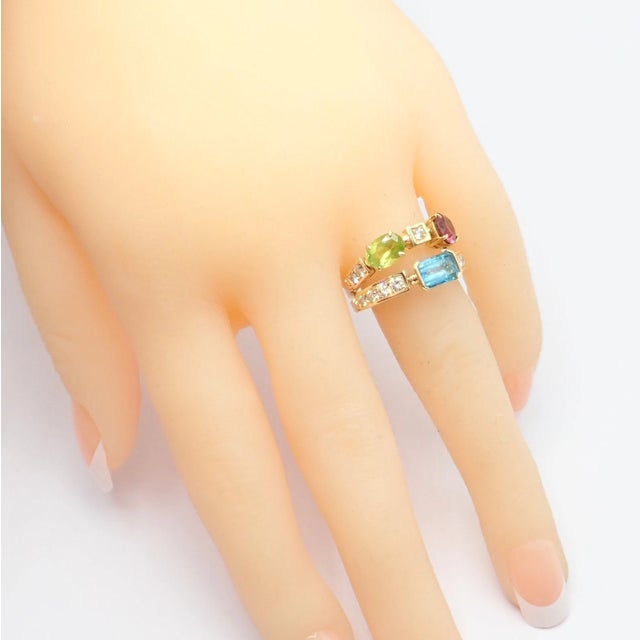 Bulgari Allegra 18k Gold Diamond Peridot Tourmaline Band Ring Details: Metal: 18k Yellow Gold Ring size: 7.25 Weight: 8.4...