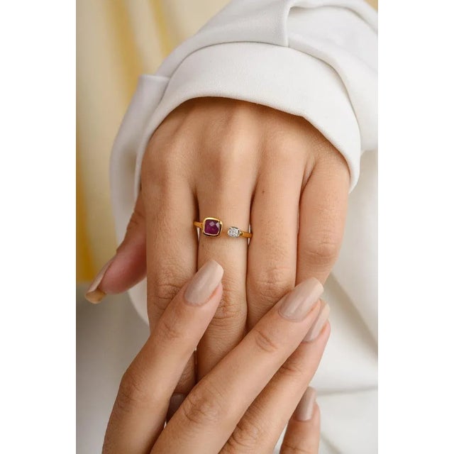 This is part of Chairish’s Fine Jewelry assortment. Ruby Diamond Open Ring in 18K Gold featuring natural ruby of 0.63...