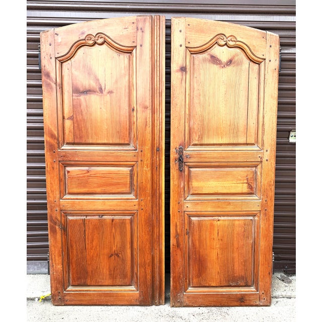 These elegant and refined pine armoire doors come from France. They once graced a beautiful armoire that was made in the...