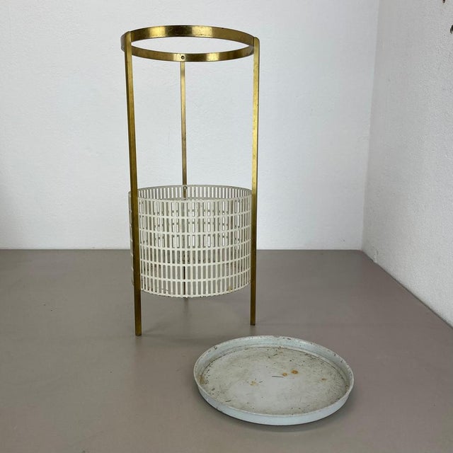 Article: Umbrella stand in style of Matégot Origin: France Age: 1950s This original vintage umbrella stand element was...