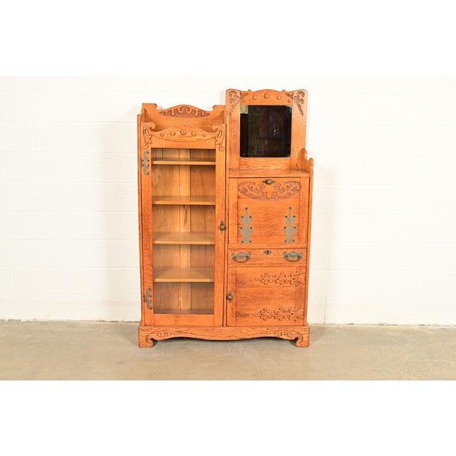 A gorgeous antique Victorian side-by-side drop front secretary desk and bookcase or display cabinet. In the manner of...