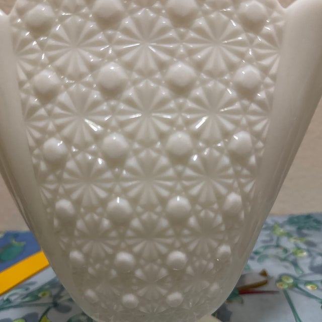 Bring a touch of Mid-Century charm and classic farmhouse elegance to your home with this beautiful Fenton style Milk Glass...