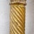 Pair of carved and gilded wooden columns, fluted and twisted decoration, topped with Corinthian capitals. Partly gilded...