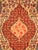 An antique Persian Malayer rug from western Iran, featuring a finely detailed Farahan-inspired floral medallion design....