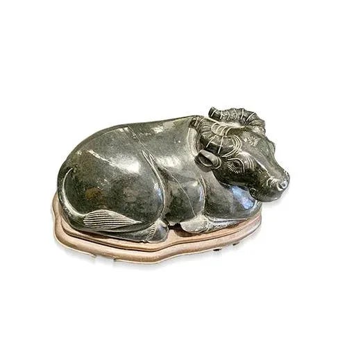 Asian antique Buffalo is made out of Black Stone. It is all hand carving. There are minor scratch/chip at the back. But it...