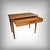 A walnut desk, crafted in the first half of the 20th century and bearing the stamp of master cabinetmaker Henry Geneste...