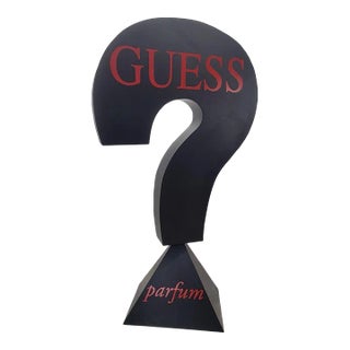 Vintage Black Wood Guess Cultural Advertising Sign For Sale