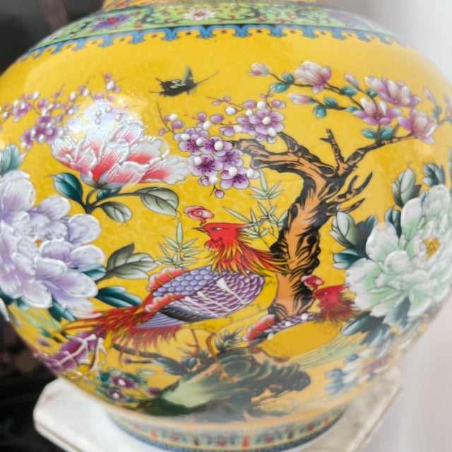 This is a beautiful LARGE temple vase in a sunny yellow glaze with beautiful flowers and birds accented in white applied...