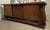 Art Deco Sideboard in Walnut and Leather on Architectural Base with Scrolls, 1930s, in Good conditions. Designed 1920 to 1949