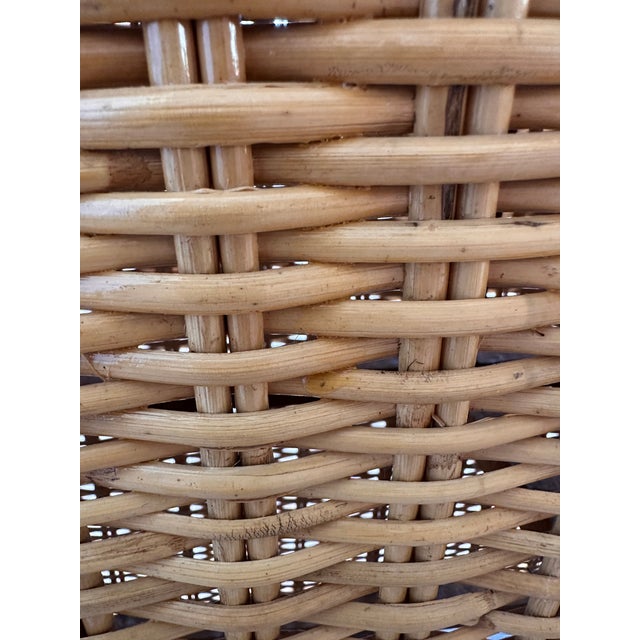 This striking 1980’s rattan weave console table embodies organic modern design with its clean lines and substantial size...