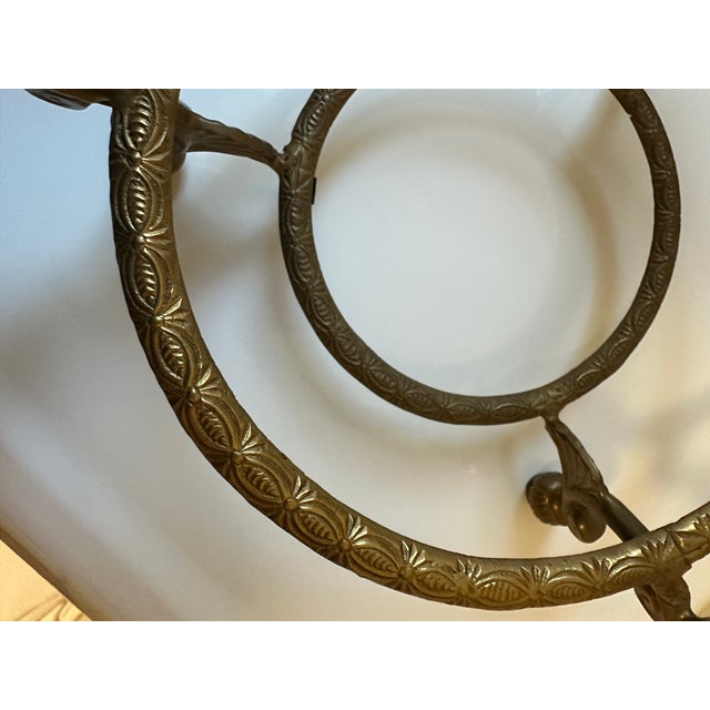 This is a French centerpiece bowl; the presence of candle cups is more often seen on silver (or other metal) centerpiece...