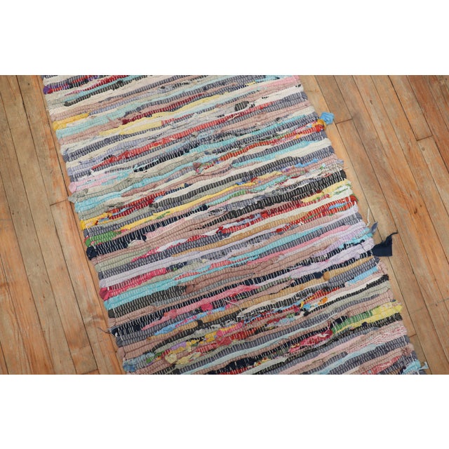 One of a kind colorful American Braid runner from the late 20th century Measures: 2'6'' x 9'1'' American Braided rugs...
