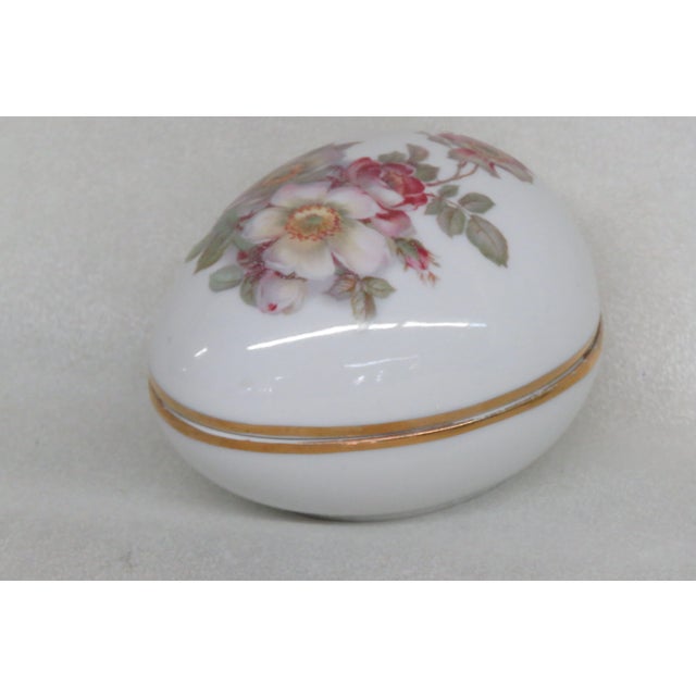 This excellent Egg Shape Trinket / Vanity Dish is made of porcelain. This wonderful Trinket Box is stamped as being made...