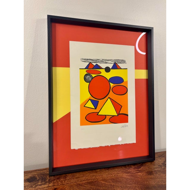 Alexander Calder lithograph titled Hommage à San Lazzaro, based on his vibrant 1975 composition. Featuring Calder’s...