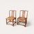 Elegant pair of Chinese Ming-style hardwood scholar chairs dating to the Late Qing / Early Republic period. Featuring...